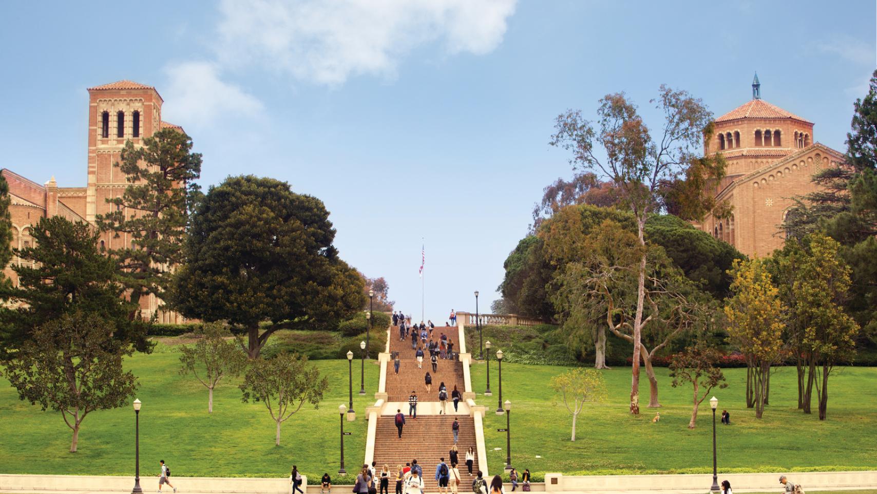 The towers of Royce Hall and the octagonal dome of Powell Library are visible at the top of Janss Steps